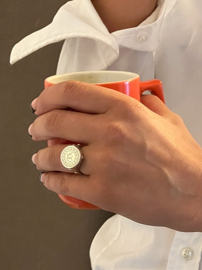 ‘100’ SIGNET SILVER RING